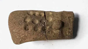 11 mysterious dots on a 2,700-year-old figurine are forcing archaeologists to rethink early writing in Guatemala | World News