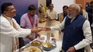 Watch: PM Modi enjoys jhalmuri at NDA meeting served by Bengal CM Suvendu Adhikari | India News
