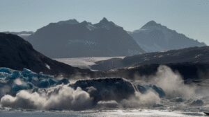 Scientists aboard RRS Sir David Attenborough watched a 1km-wide, 100m-thick section of Greenland’s Sorgenfri glacier break away, weighing an estimated 18 million tonnes