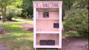 A Cumberland mother’s new farm stand was stolen before she could use it; strangers John and Casey Adams rebuilt it for free, even after their tools were stolen