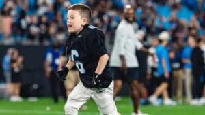 Born with a complex heart condition, a 6-year-old signed with the Carolina Panthers for one day and scored a touchdown in an NFL stadium | NFL News