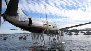 Canada lowered a retired Boeing 737 onto the seabed off Vancouver Island; the 100-foot jet now sits nearly 90 feet underwater as an artificial reef for marine life