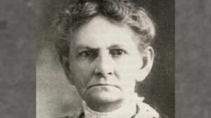 In 1908, an unschooled Indiana widow began a 20-year fight to defend 120 acres of Lake Michigan dunes from a steel giant; 72 years later, 212 acres including part of her tract joined Indiana Dunes to remain open space forever