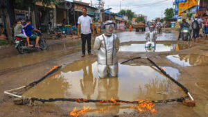 Over 100 Jaipur residents stage unique protest against potholes