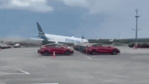 Video captures moment Amazon cargo plane hurtles off runway, erupts in flames