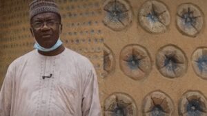 A Nigerian engineer built his first model house with 14,800 sand-filled plastic bottles; the experiment later grew into 15 houses, including a five-bedroom duplex