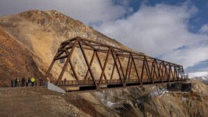 In 2021, a landslide cut Denali National Park’s only road in two; five years later a $230 million, 475-foot bridge has been built directly above the still-moving slope